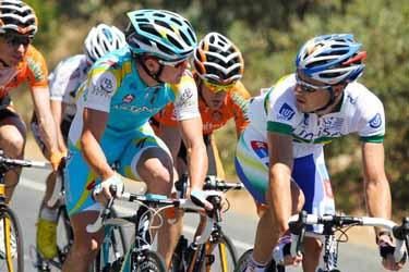 Fellow Aussies Simon Clarke (Astana) and Mitchell Docker (Uni SA) talk tactics at the front of the break.