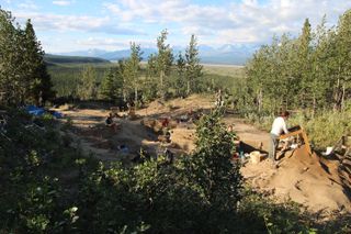 Archaeologists excavate an ancient site in Beringia.