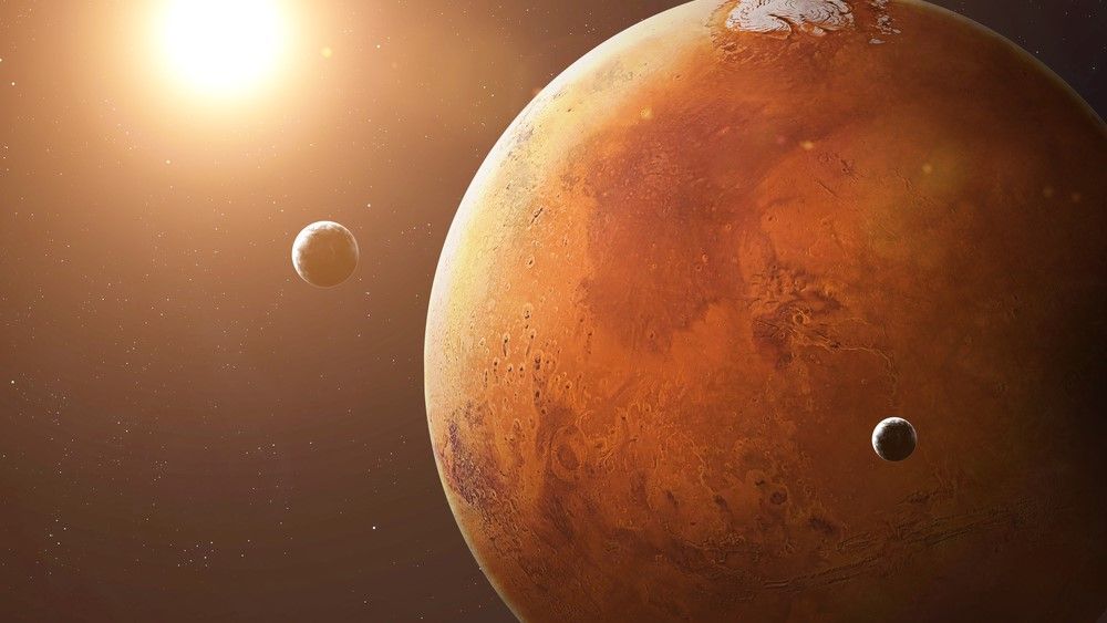 Mars may be slowly ripping its largest moon apart