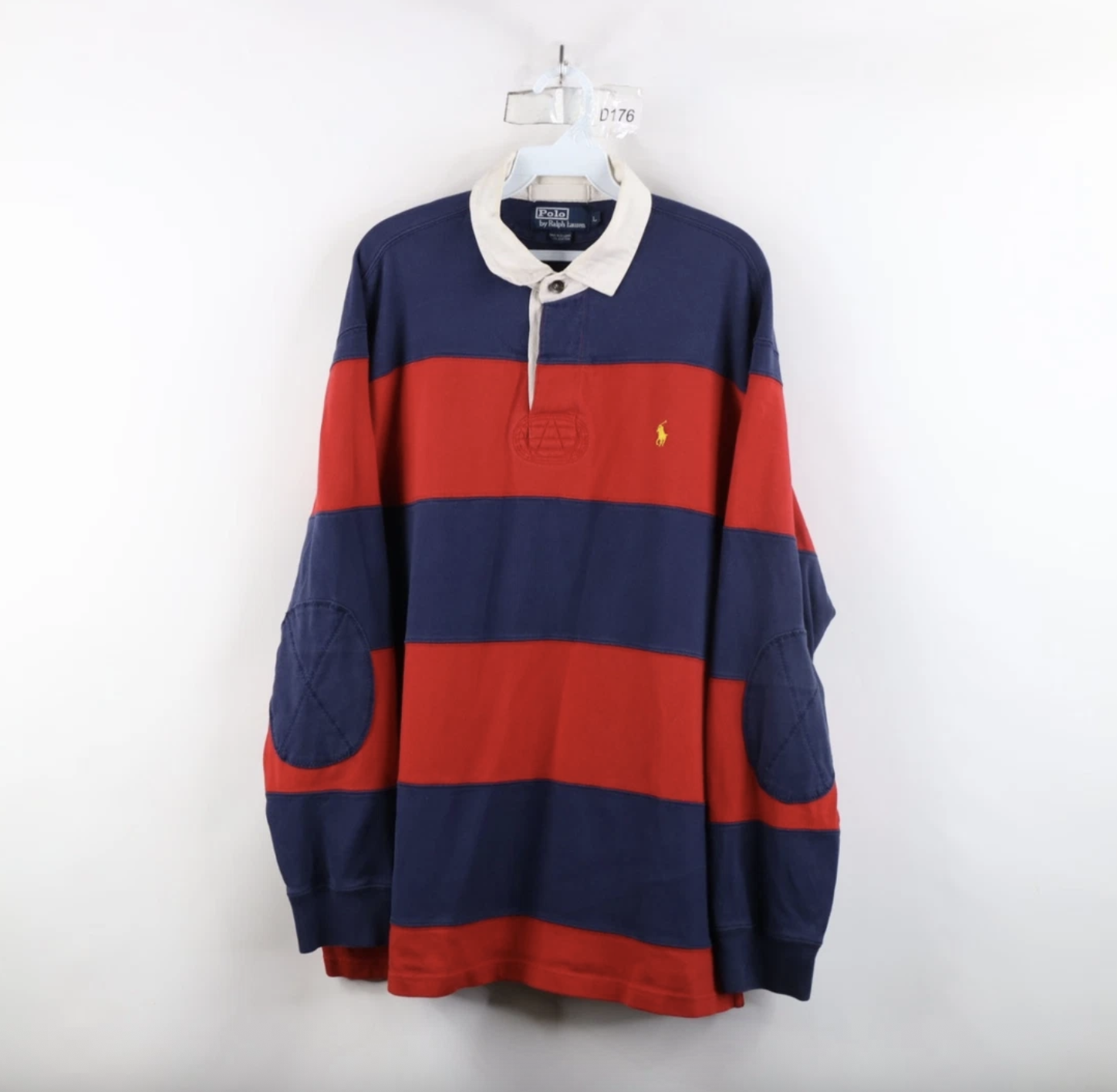 a ralph lauren rugby shirt on a hanger