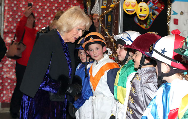 ‘You remind me of another jockey…’ The Duchess of Cornwall heads to the stables at Olympia to meet the Shetland Grand National jockeys — including Frankie Dettori’s son Rocco