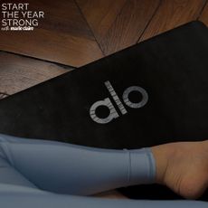 woman working out on one of the Best exercise mats from Alo