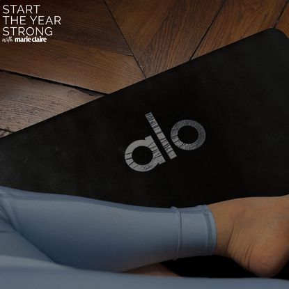 woman working out on one of the Best exercise mats from Alo