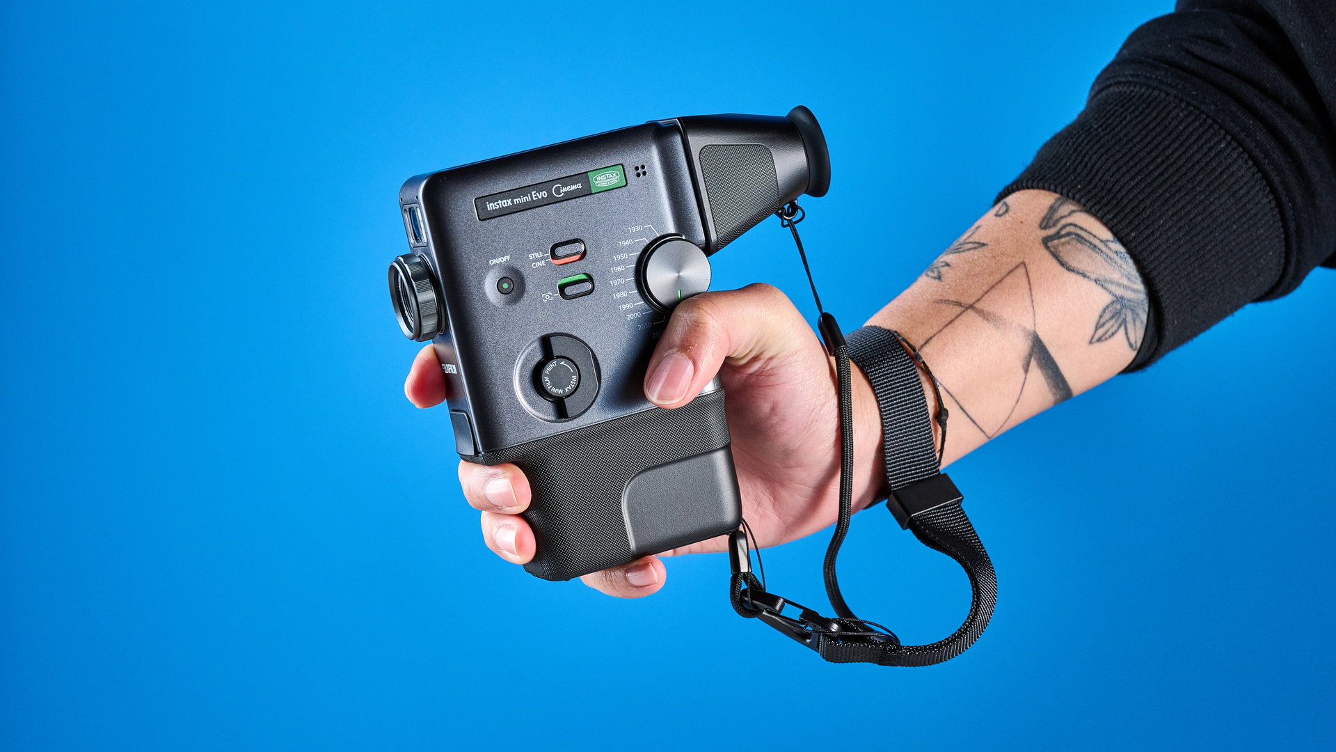 A Fujifilm Instax mini Evo Cinema hybrid instant camera