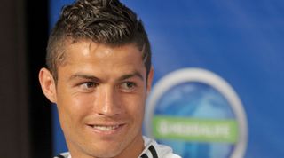 CENTURY CITY, CA - JULY 12: Cristiano Ronaldo of Real Madrid poses at the Herbalife World Football Challenge Superstar Press Conference at Creative Artists Agency's Ray Kurtzman Theatre on July 12, 2011 in Century City, California. (Photo by Gregg DeGuire/FilmMagic)