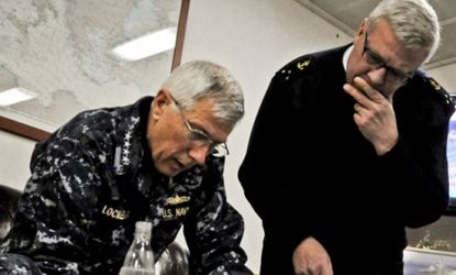 U.S Navy Adm. Samuel J. Locklear III (left), commander of the U.S. mission in Libya, speaks with his French counterpart Tuesday.