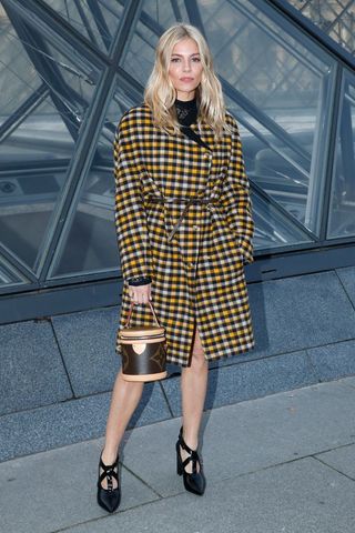 Sienna Miller carrying a Louis Vuitton bag