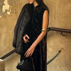 Alexis Badiyi wearing a black dress