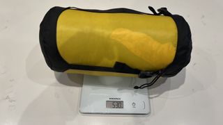 Sea to Summit Spark SPII -2° sleeping bag packed, on scales showing weight