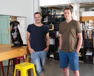 Toby Pike and Pete Stopniak in their third studio space – an old warehouse built circa 1926, complete with dog, two-tonne cranes and concrete floors