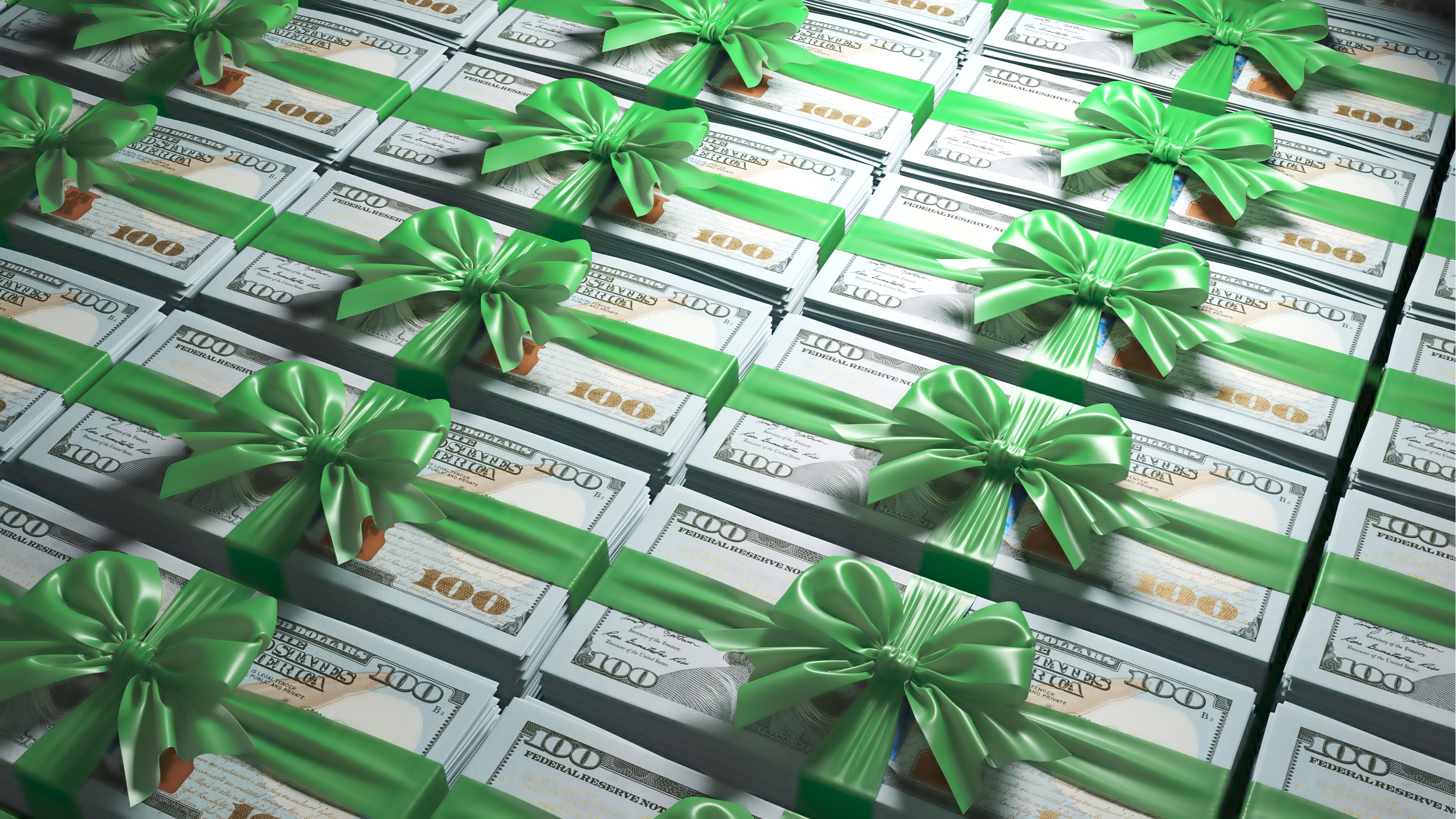 Many stacks of hundred-dollar bills wrapped in green bows.