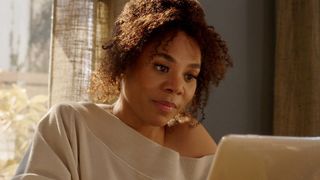 Regina Hall as Candace sitting in front of a laptop in The Best Man: The Final Chapters