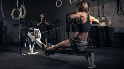 Woman doing a workout on a rowing machine