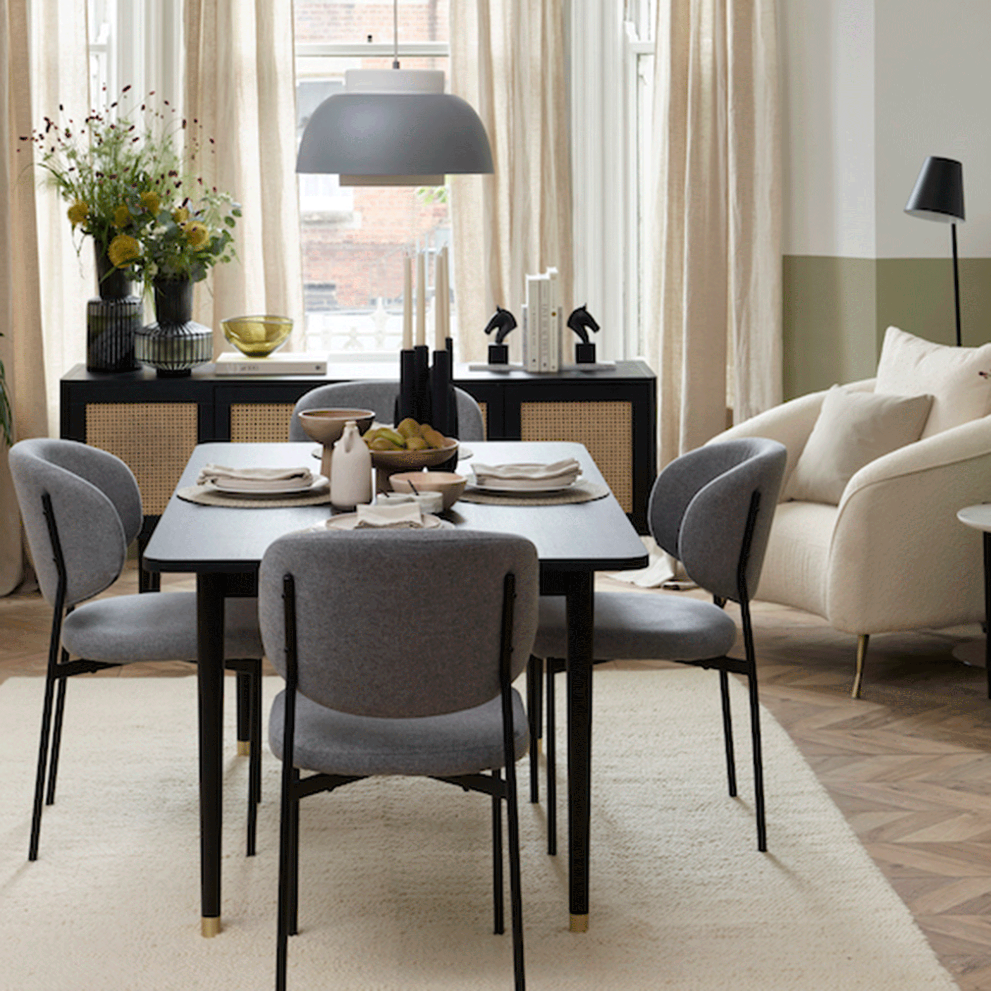 Small dining room with white armchair