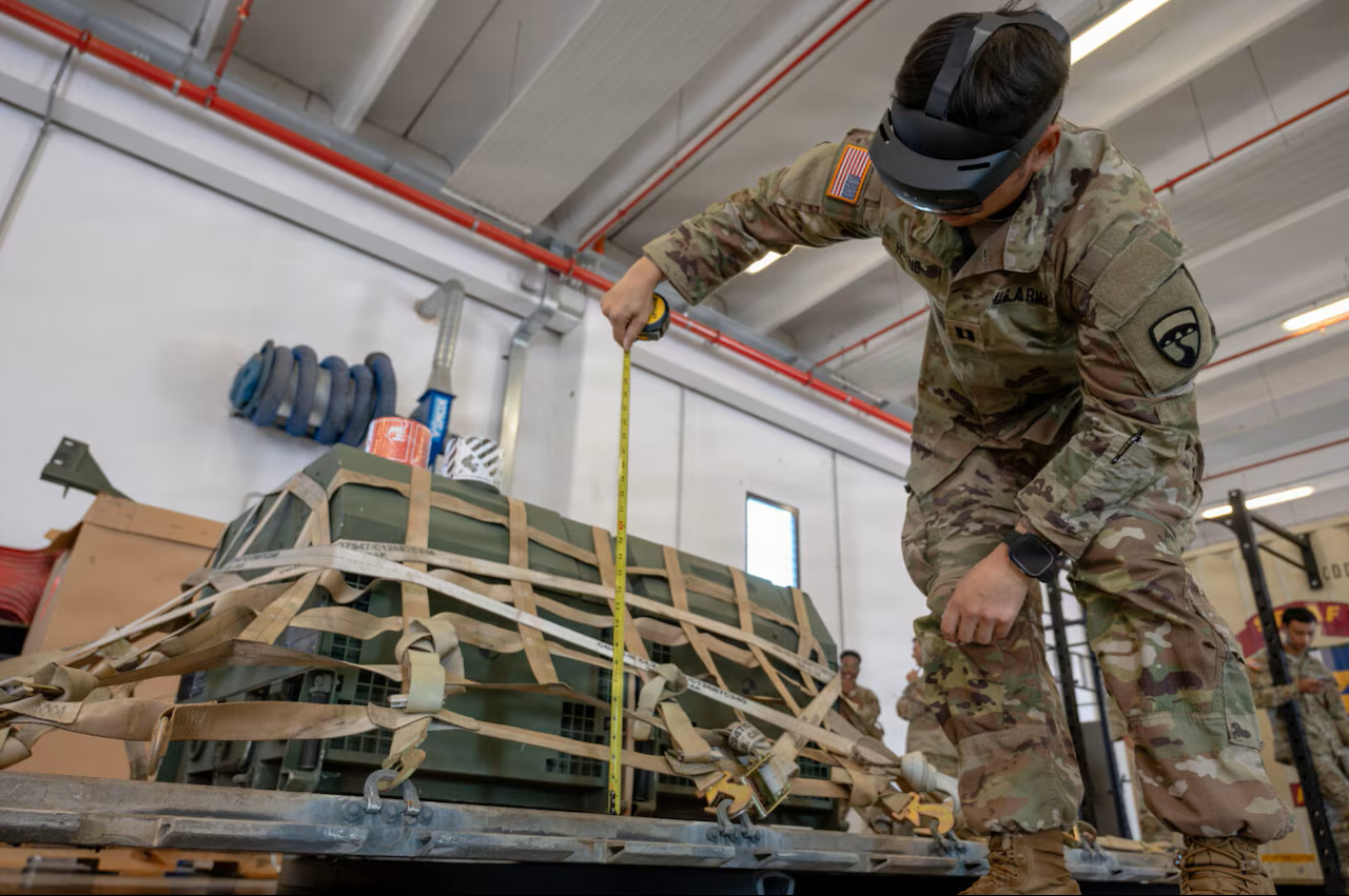 A soldier assigned to the 173rd Airborne Brigade uses the HoloLens during a joint cargo inspection in Vicenza, Italy, Aug. 26, 2025.