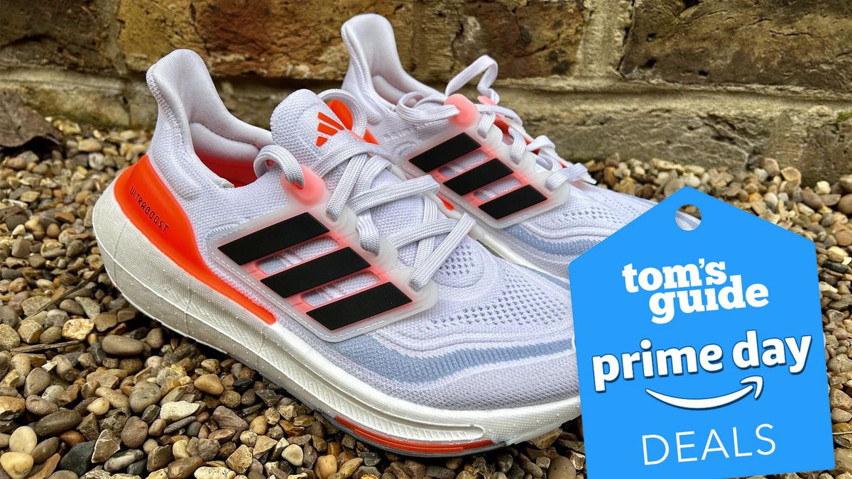 Adidas Ultraboost 23 running shoe outdoors on gravel with Prime Day badge