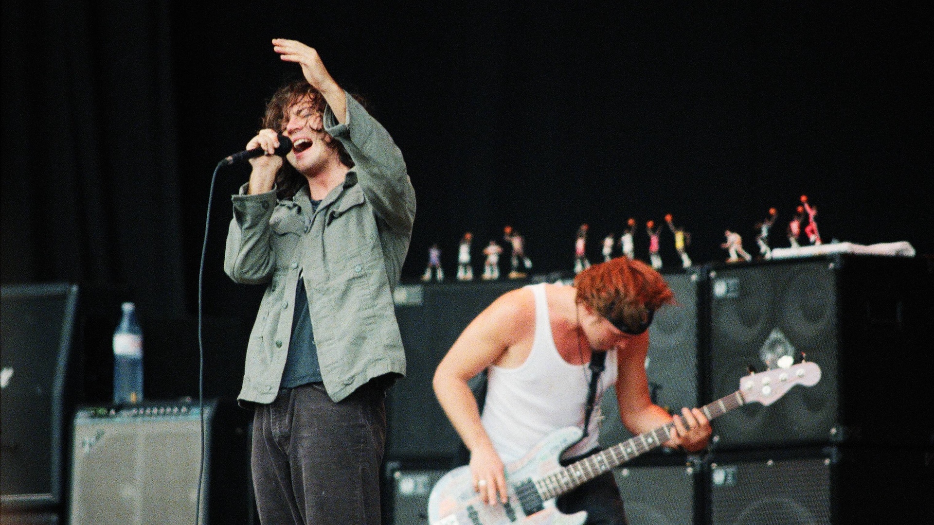 Eddie Vedder and Jeff Ament of Pearl Jam perform on stage in Finsbury Park on July 11th, 1993 in London