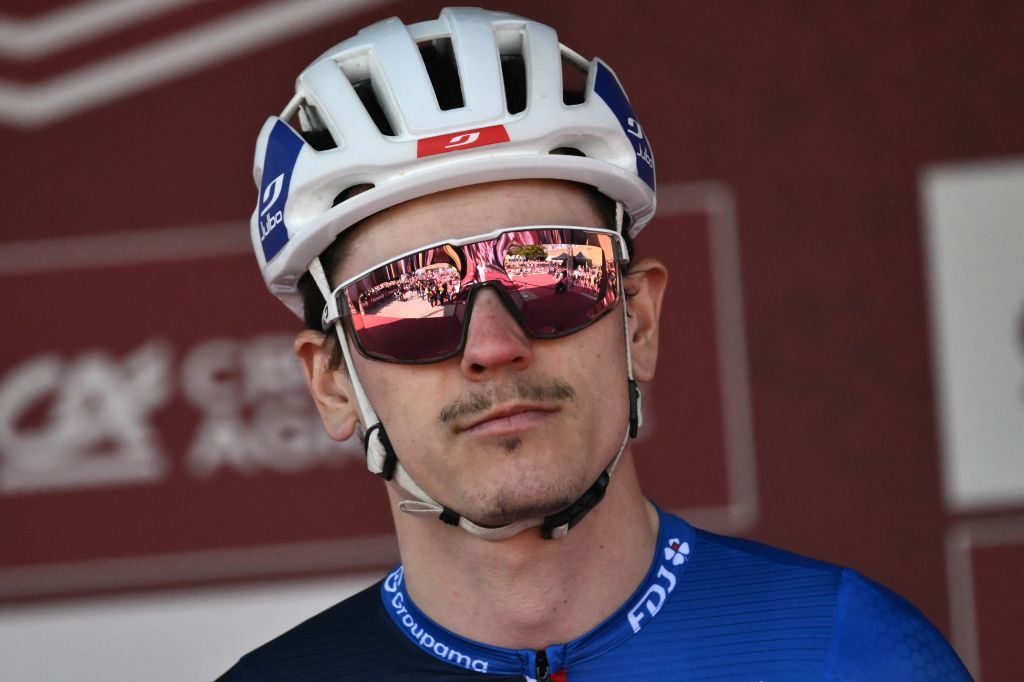 Team Groupama-FDJ&#039;s French rider David Gaudu looks on before the 19th one-day classic &#039;Strade Bianche&#039; (White Roads) cycling race between Siena and Siena, Tuscany, on March 8, 2025. (Photo by Marco BERTORELLO / AFP)