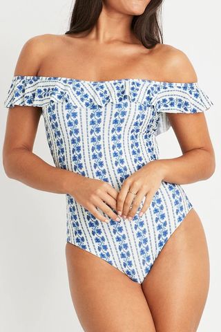 white and blue patterned one piece swimsuit