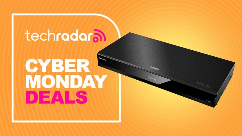 The Panasonic DP-UB820 4K Blu-ray player with a sign saying Cyber Monday deals