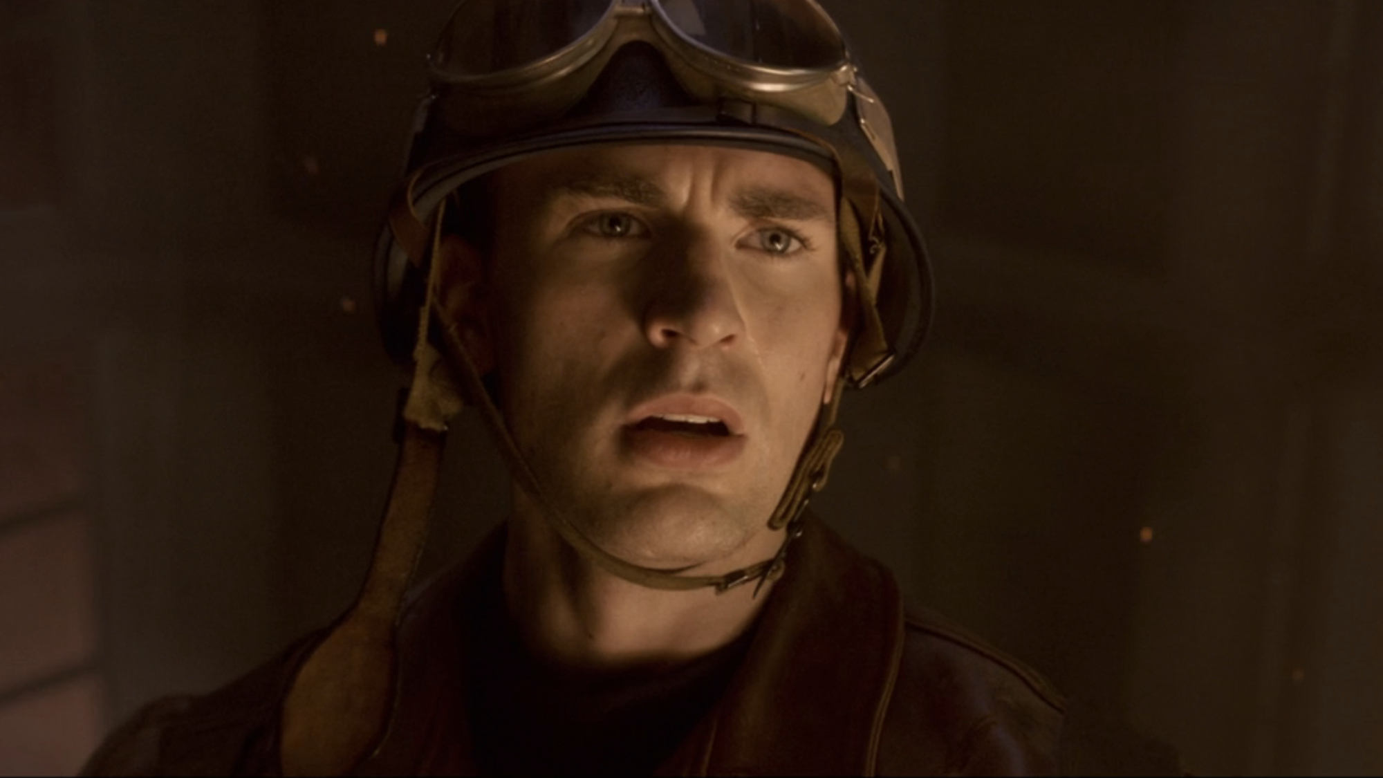Steve Rogers (Chris Evans) looks at the Red Skull in Captain America: The First Avenger.