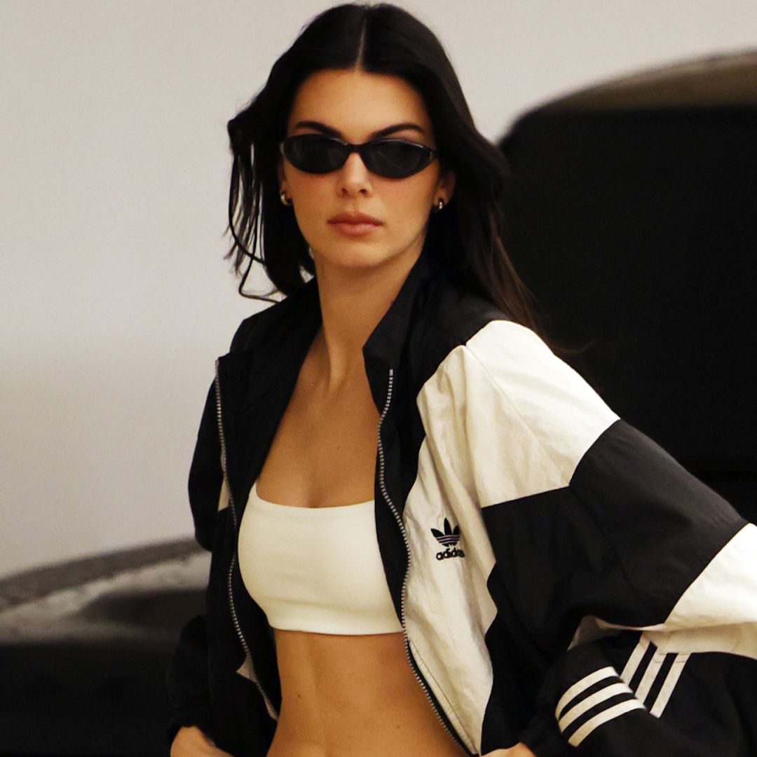 Kendall Jenner wore black-and-white Adidas Originals Superstar sneakers with a vintage track jacket in L.A.