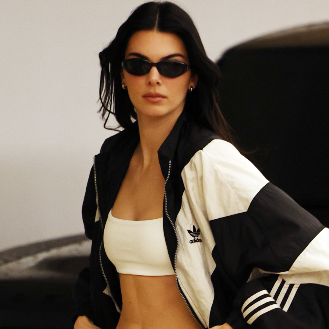 Kendall Jenner wore black-and-white Adidas Originals Superstar sneakers with a vintage track jacket in L.A.