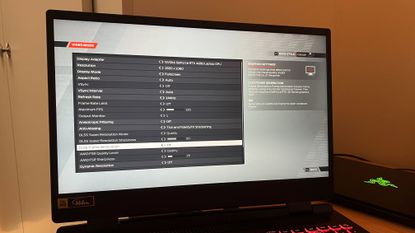 Acer Nitro gaming laptop screen showing DLSS video settings menu on F1 22
