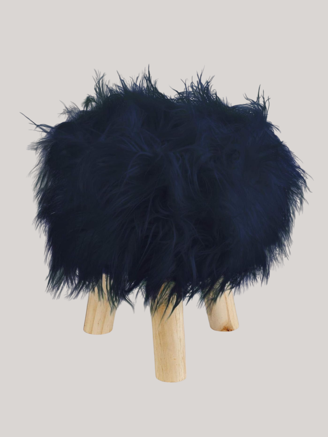 A fuzzy blue stool with light wood legs
