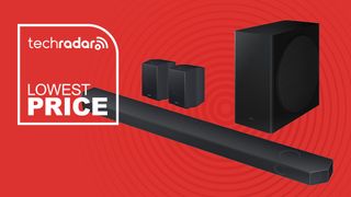 Samsung HW-Q930C soundbar nest to a sign saying Lowest Price