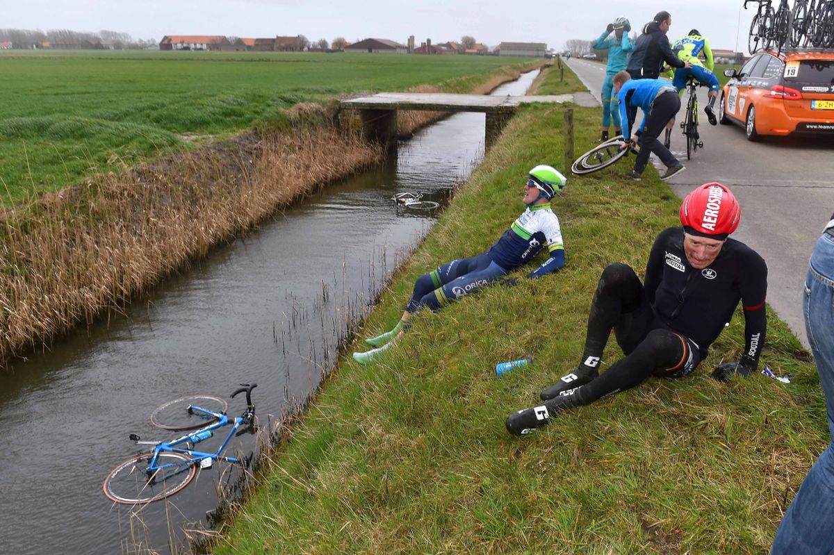 Luke Durbridge (Orica-GreenEdge) stops himself from having a swim while his bikes floats in the water