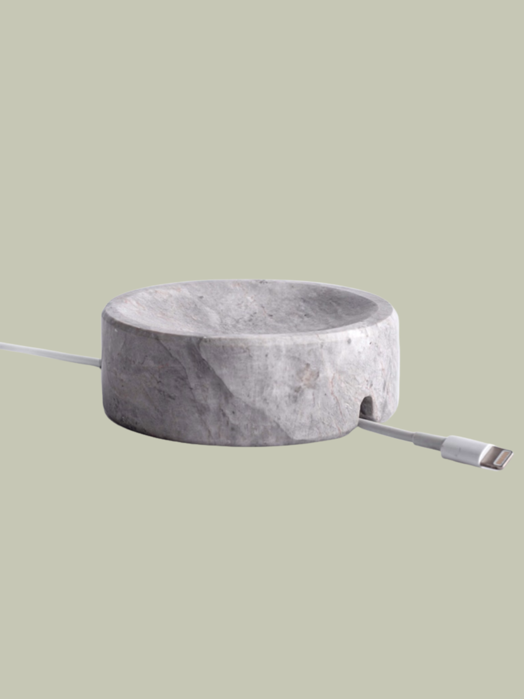 A gray marble cord holder from And Jacob