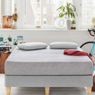 Leesa mattress on a bed with pillows.
