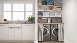 kitchen cabinets next to utility area with washing machines and cleaning supplies