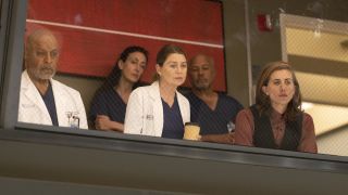 Richard Webber, Meredith Grey and Kai Bartley sit in the gallery on Grey's Anatomy.