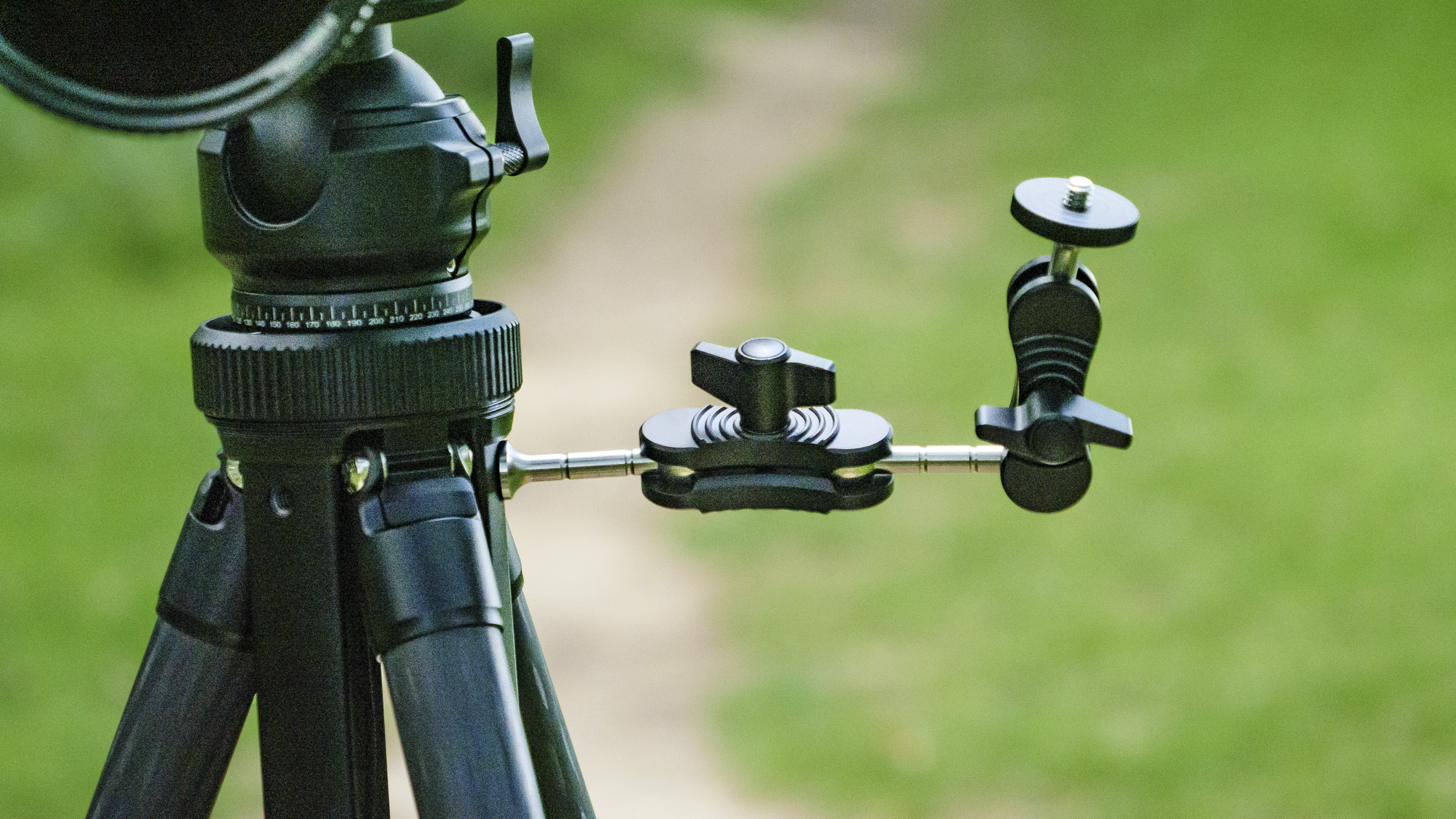 Heipi 3-in-1 Travel Tripod W28S with optional mounting arm attached