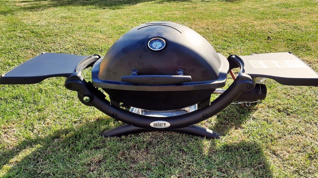 Weber Q1200 portable gas grill being tested in writer&#039;s home