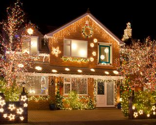 Home and garden decorated with fairy lights