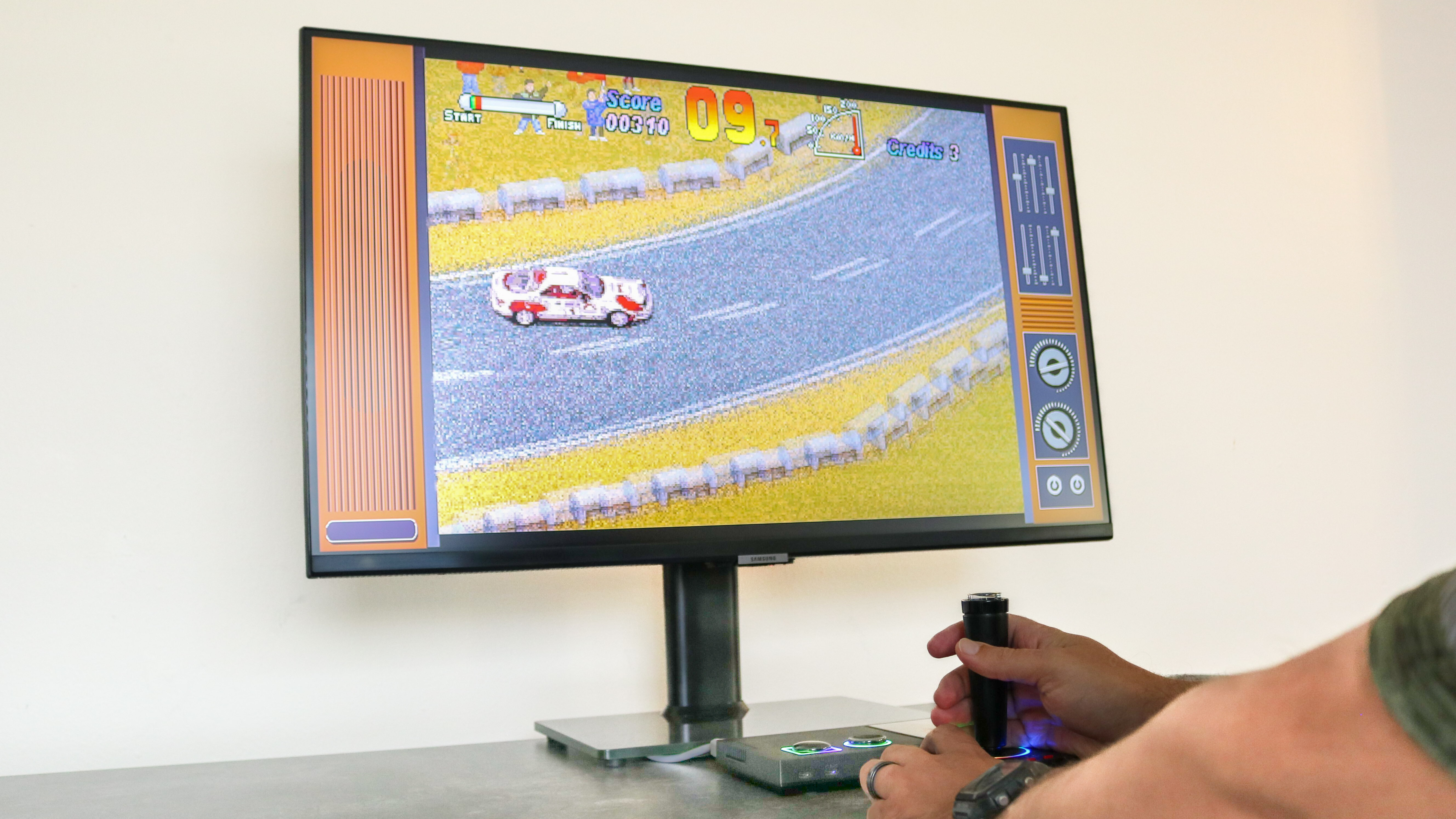 Playing a racing game on the Atari GameStation Pro