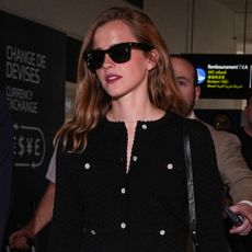 Emma Watson arrives at the 2025 Cannes Film Festival wearing a Chanel dress