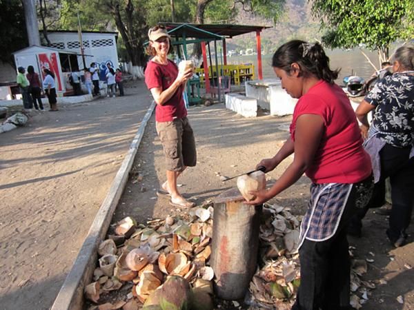 Mary McConneloug enjoys a special recovery drink in Guatemala.