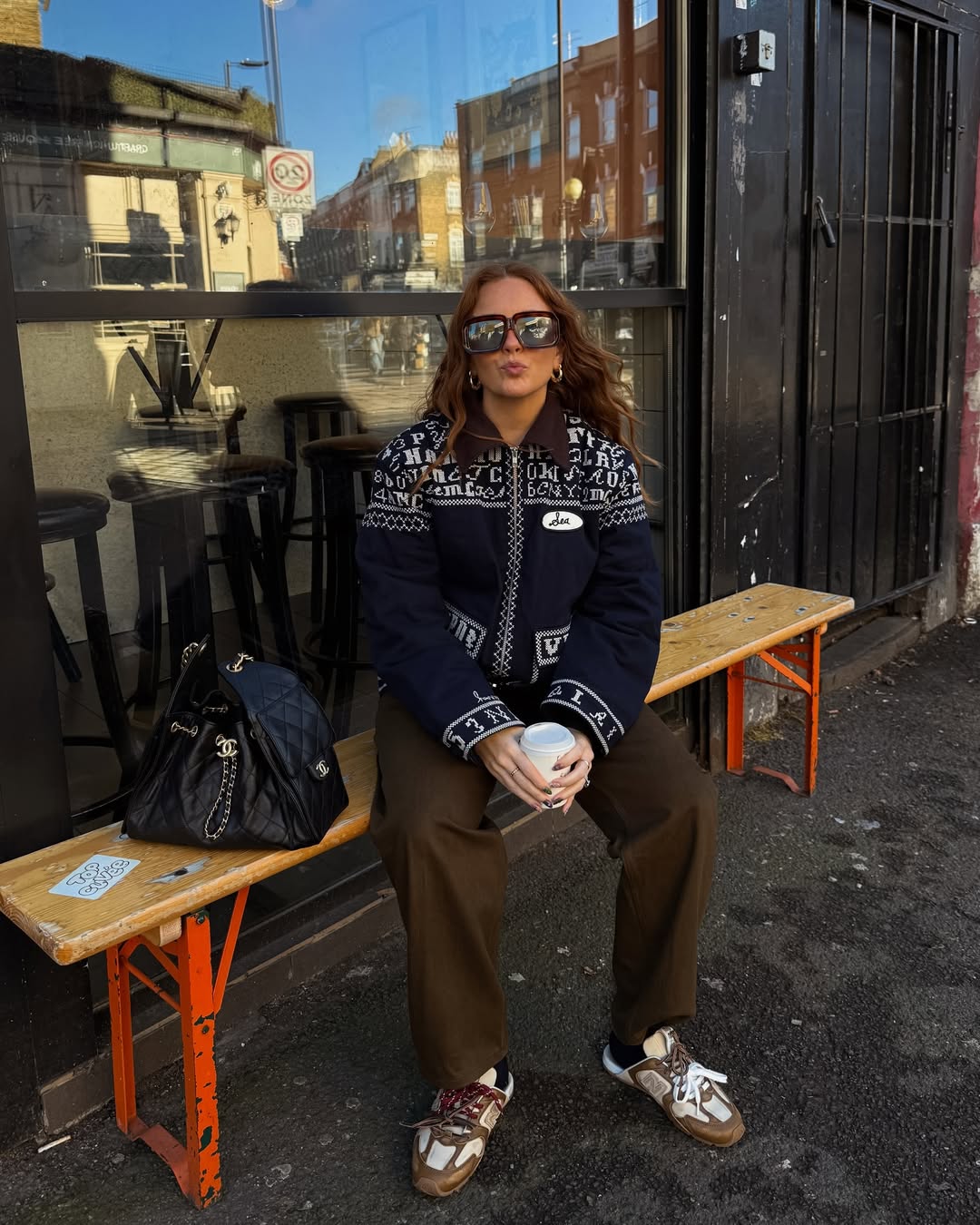 Rebecca Olivia wears double lace trainers.