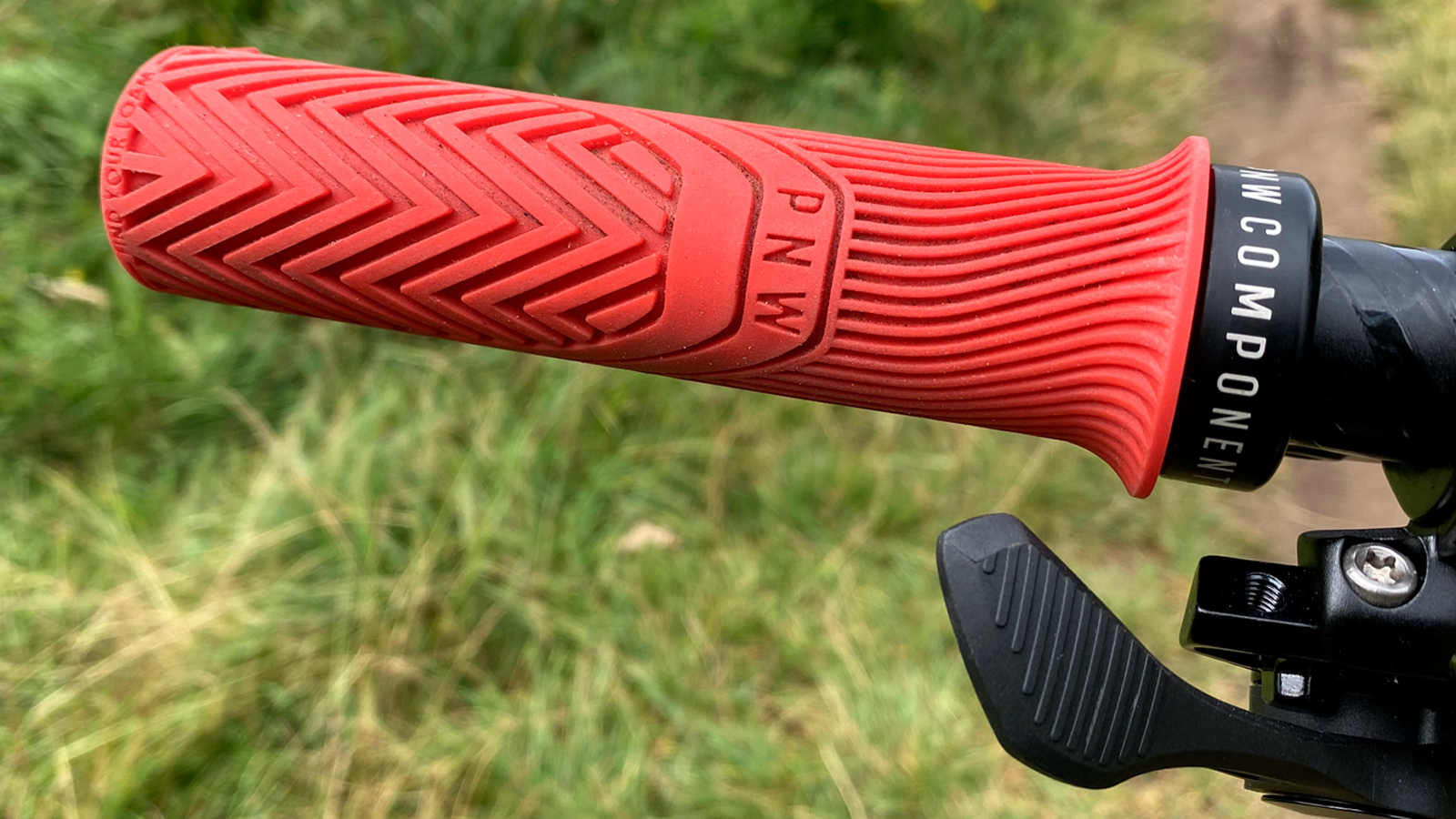 A PNW Loam grip attached to a MTB handlebar