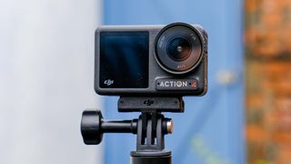 DJI Osmo Action 4 attached to tripod