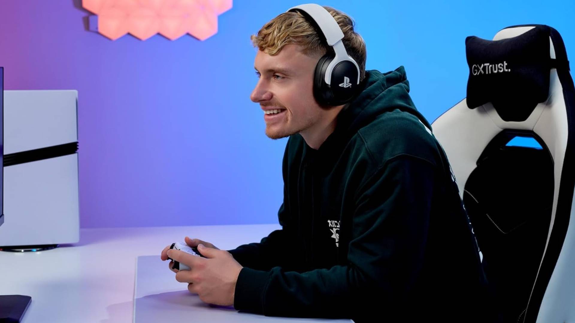 Official GXTrust marketing image showing a person wearing the Forta Wireless PS5 headset.