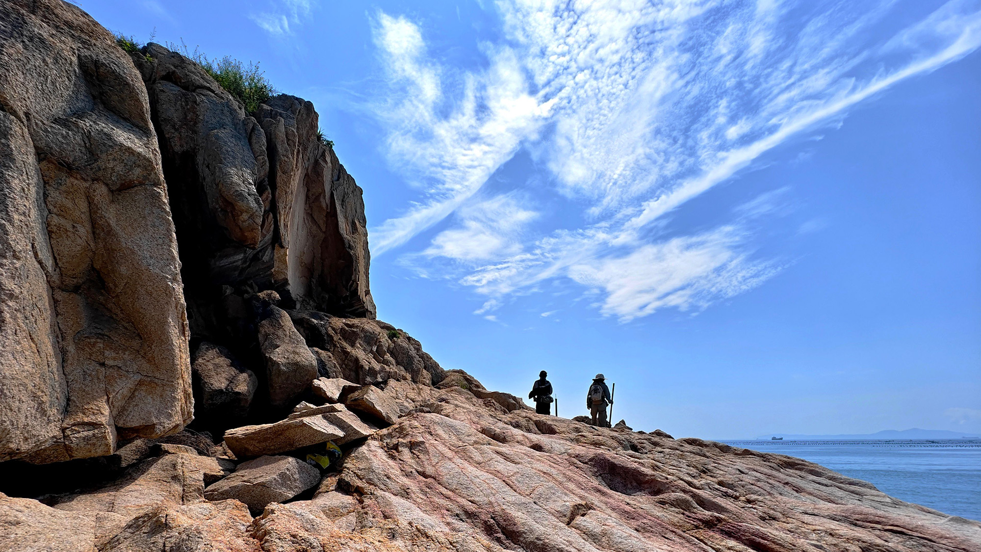 Two people are seen walking on the rarely visited Simuyu Island in Fuzhou, China