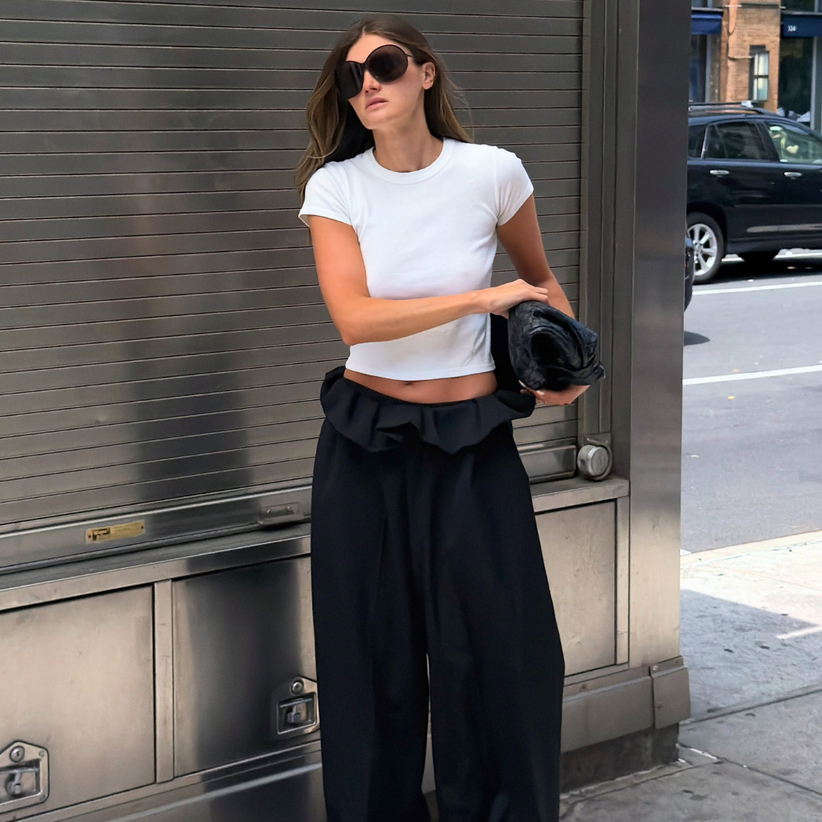An image of a woman wearing anti denim fall pants shopping