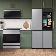 A green kitchen with Samsung appliances