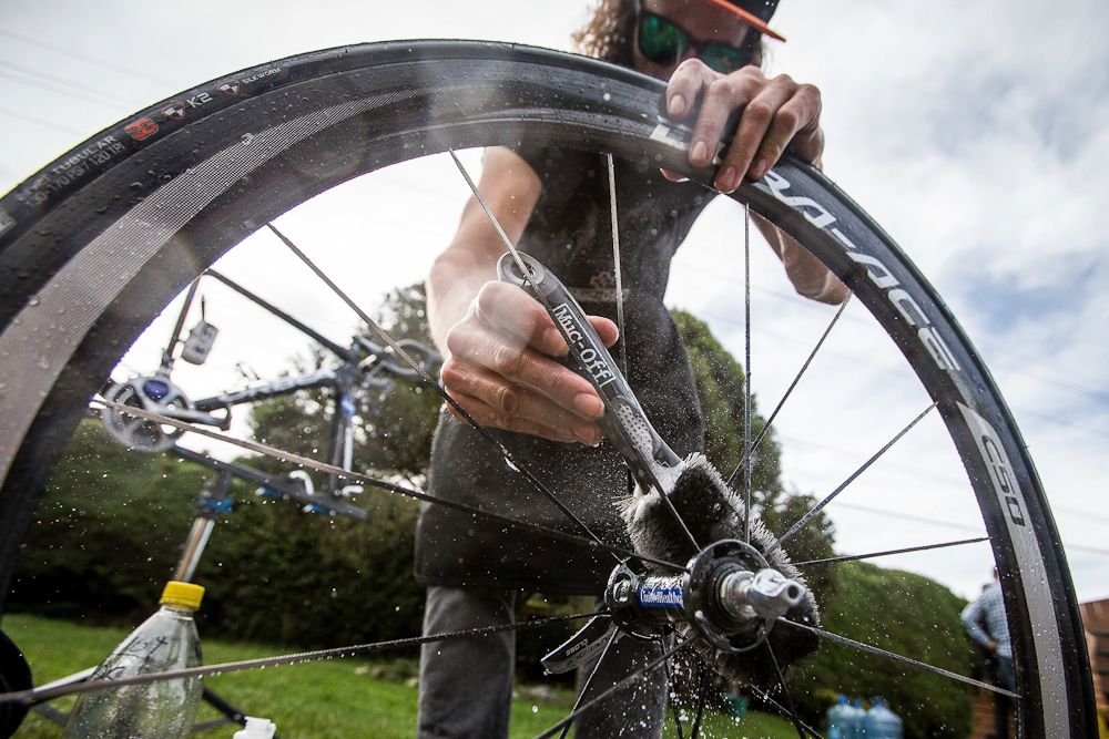 Team mechanic David Sagat gets a wheel ready to roll.