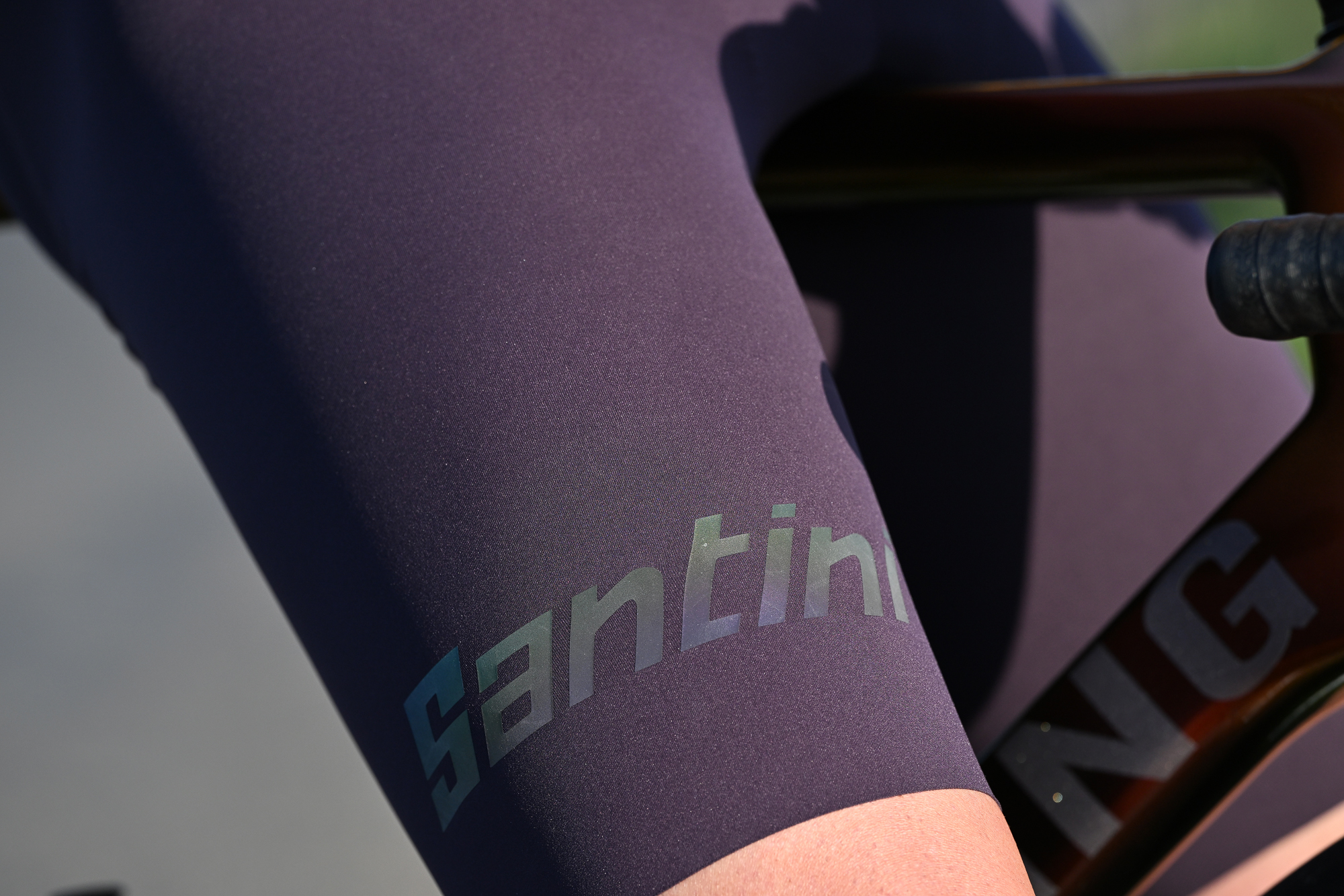 Close up of the Santini branding on a pair of purple cycling shorts